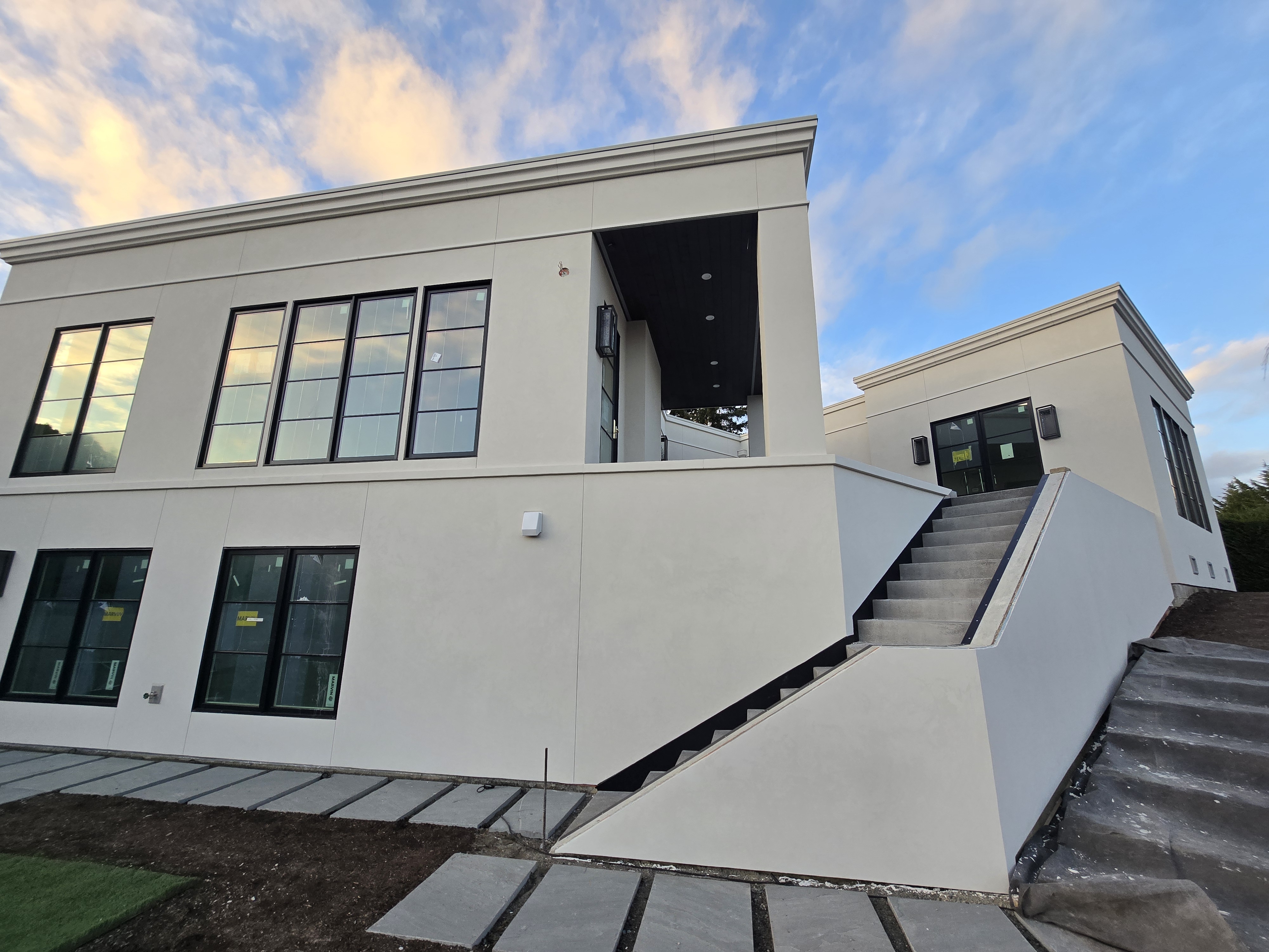 Modern stucco exterior with staircase